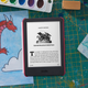 The new Kindle Kids e-reader in a case with a colorful design.